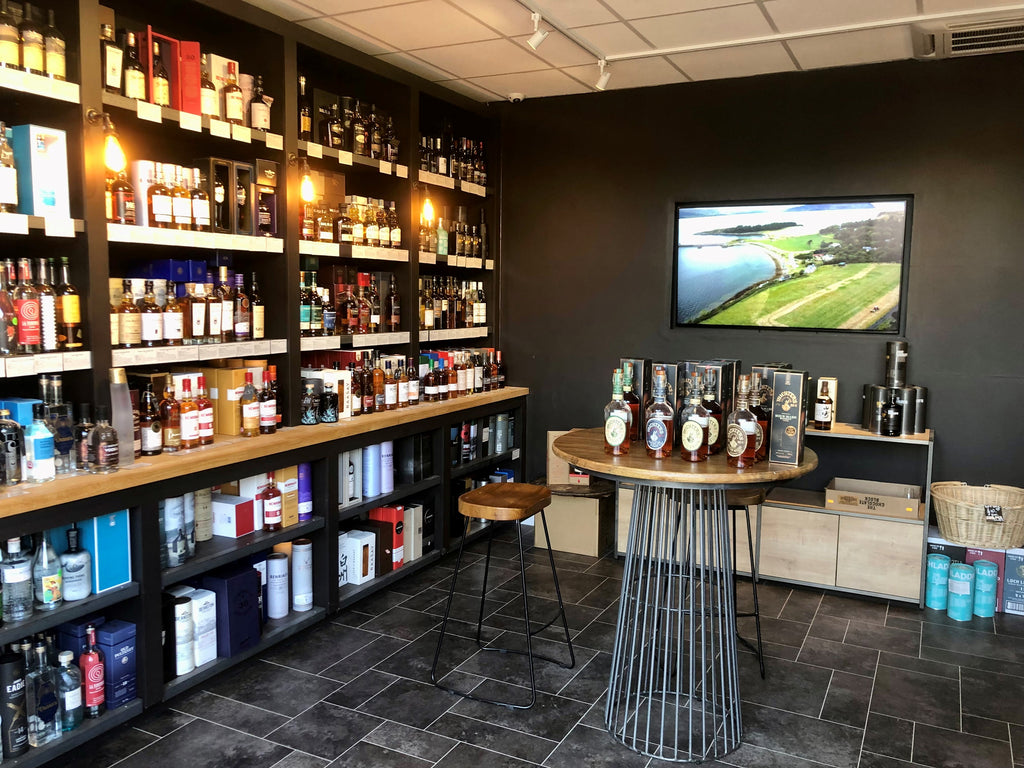Inside The Spirits Room shop with bottles of whisky, rum, and more
